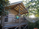 Cabane sur pilotis au camping 5 étoiles Le Vieux Port dans les Landes