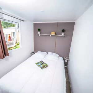 Chambre à coucher d'un mobil home Eco