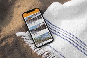 Mockup d'application mobile du camping affichant la rubrique commerces, avec une interface épurée et moderne. L’écran présente une liste de commerces disponibles sur le site, illustrée par des icônes colorées et du texte clair, permettant aux utilisateurs de naviguer facilement parmi les différentes options d’achat et de services proposés au camping. Les éléments visuels incluent des boutons interactifs pour accéder aux détails des commerces et un menu de navigation en bas de l’écran pour une expérience