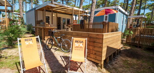 Vue ensemble Cottage Duo Suite Premium jacuzzi 6 personnes dans les Landes au camping Le Vieux Port