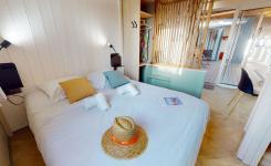 Chambre du module du chalet Premium 6 personnes au camping 5 étoiles Le Vieux Port à Messanges dans les Landes