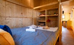 Chambre parentale tente Ecoluxe 4/5P avec grand lit camping Le Vieux Port